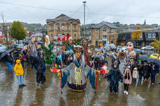 Giant puppets paraded around Batley and Dewsbury town centres on Saturday