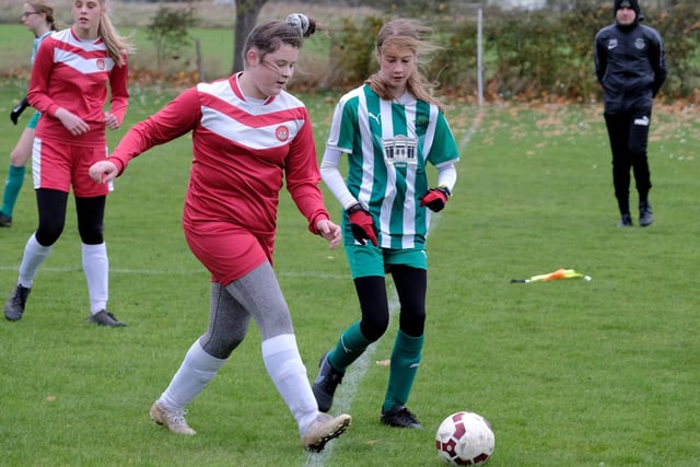 Scarborough's Ava Hutchings takes the ball clear

Photo by Richard Ponter