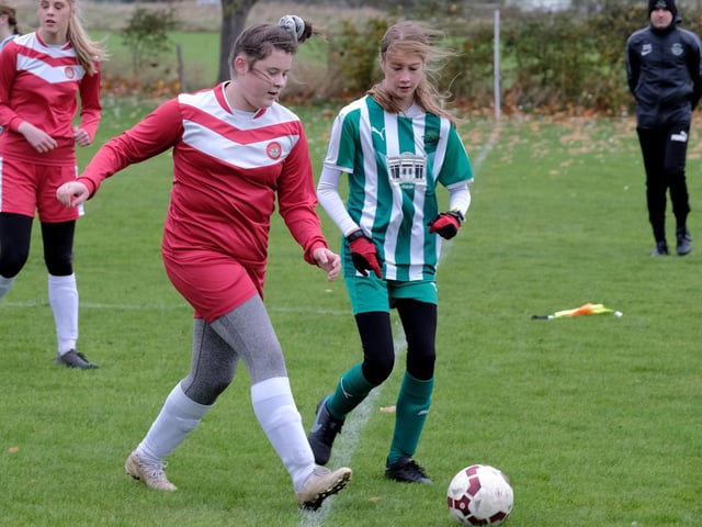 Scarborough's Ava Hutchings takes the ball clear

Photo by Richard Ponter