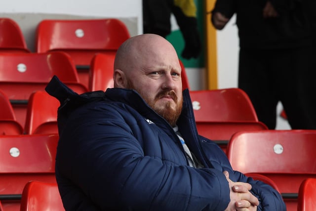A PNE fan sits waiting for kick-off at Nottingham Forest