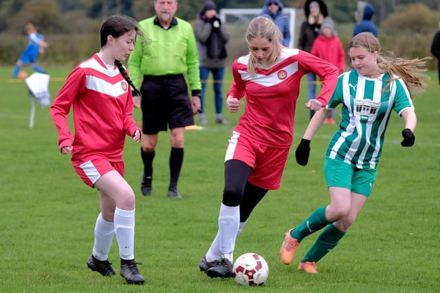 Jess Morgan brings the ball away for the hosts with teammate Milly Walker looking on

Photo by Richard Ponter
