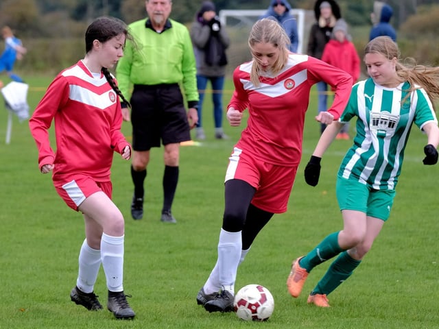 Jess Morgan brings the ball away for the hosts with teammate Milly Walker looking on

Photo by Richard Ponter