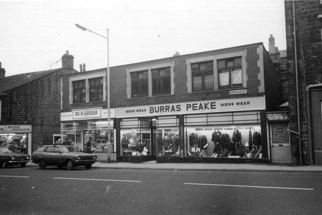 Shops on Boroughgate. On the far left is Coombes shoe repairs, then a block containing Av-a-gander, a discount store selling household goods, toiletries and gifts, and Burras Peake Ltd., menswear.