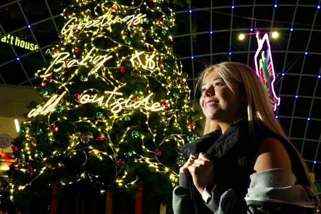 Pictured by the Christmas tree in Trinity Leeds is Olivia Chadwick from Wakefield