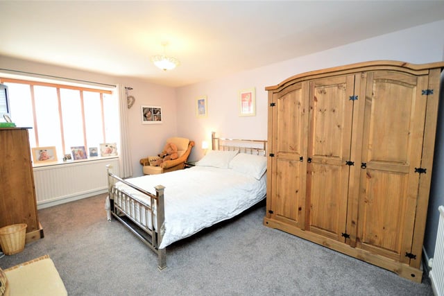 One of the bedrooms with free standing furniture within the Lees Yard cottage.