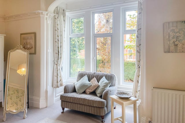This window is a lovely bedroom feature that adds space to the room.