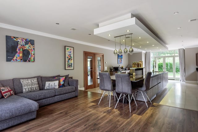 Leading off the kitchen is a wonderful family seating area perfect for relaxing.