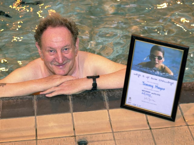 This is Tommy Hayes who received an award for long distance swimming at Armley Leisure Centre in December 2001.