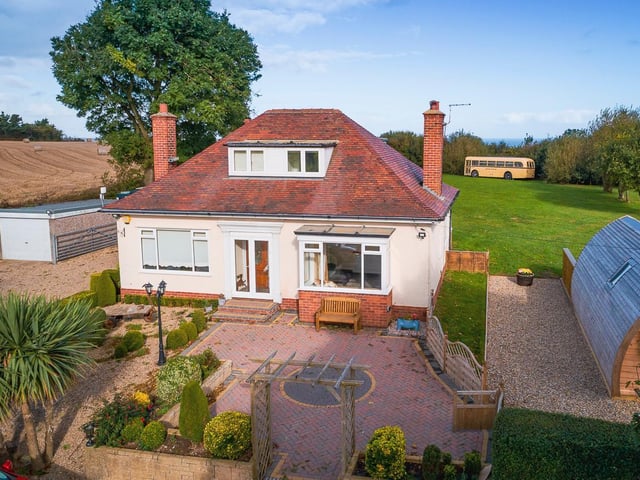 The frontage of the home that sits within two and a half acres of land.