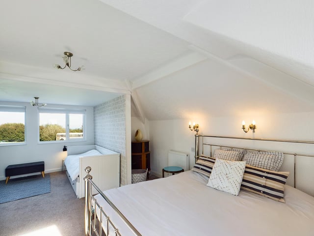 An individually styled double bedroom.