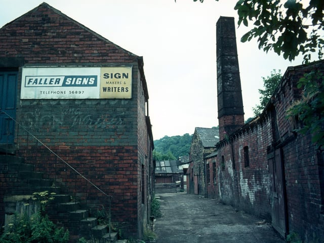 Derelict buildings of Woodlands Dyeworks on Wood Lane pictured in July 1975 shortly before demolition. Known as Crowther's Mill and previously Rowley's Mill and Wood's Mill, there is believed to have been a mill on the site since 1601.