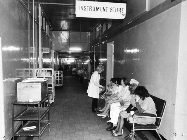 The queue waiting in the corridor outside Leeds General Infirmary's instrument store in January 1975.