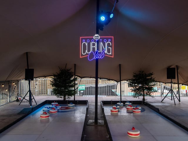 On the top floor is the rooftop curling club as well as a photo booth and beer pong.