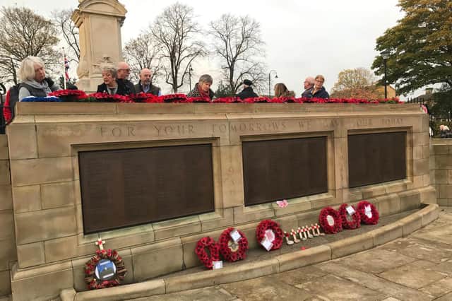Wreaths laid at the war memorial in Cleckheaton Memorial Park