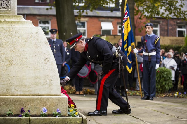 Deputy Lieutenant of West Yorkshire Jon Hammond-Booth lays a wreath
