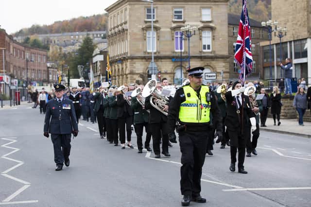 Huddersfield and Ripponden Band lead the Remembrance Sunday parade in Dewsbury