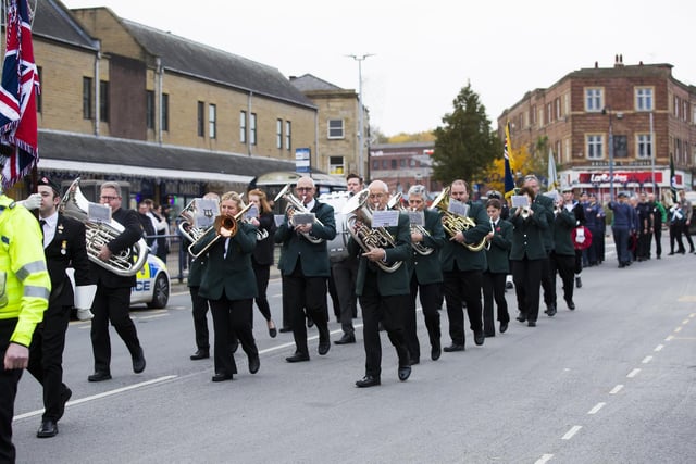 Huddersfield and Ripponden Band lead the parade in Dewsbury