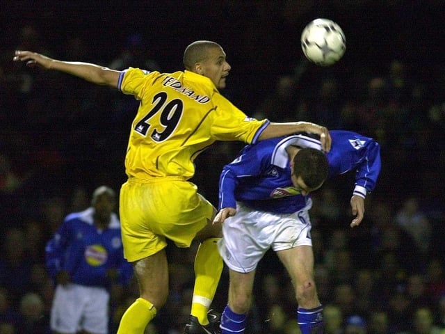 Rio Ferdinand heads clear on his Leeds United debut under pressure from Leicester City's Muzzy Izzet during the Premiership clash at Filbert Street in December 2000.