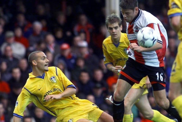 Rio Ferdinand tackles Southampton striker James Beattie during their Premiership match at The Dell in December 2000. The Saints won 1-0.