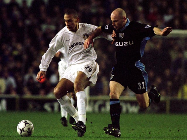 Rio Ferdinand holds off Coventry City's Lee Carsley during the Premiership clash at Elland Road in January 2001. Leeds won 1-0.