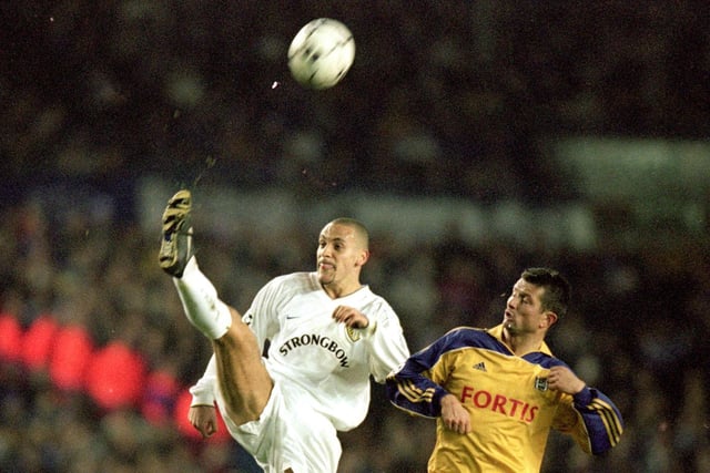 Rio Ferdinand clears the ball from Anderlecht's Tomasz Radzinski during the UEFA Champions League Group D match at Elland Road in February 2001. Leeds won 2-1.