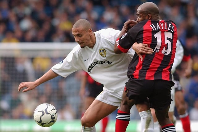 Rio Ferdinand holds off Fulham's Barry Hayles during the Premiership clash at Elland Road in April 2002.