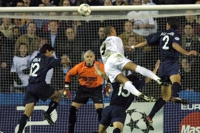 Rio Ferdinand goes airborne among a host of Valencia defenders while their goalkeeper Santiago Cañizares watches the ball during the UEFA Champions League semi-final first leg clash at Elland Road in May 2001.