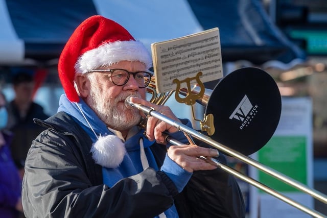 Pictured is Mike Searle, a member of the Bedale Brass Band entertaining visitors at the Bedale Christmas Market on December 19, 2020.