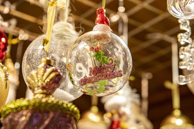 Stalls are selling Christmas baubles to put on your tree.