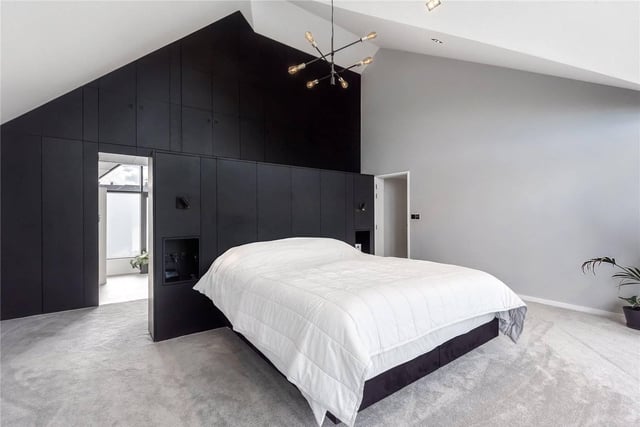 The main bedroom has an impressive vaulted ceiling with ample built in wardrobes, bespoke feature headboard, and a great size balcony to enjoy the breath-taking views.