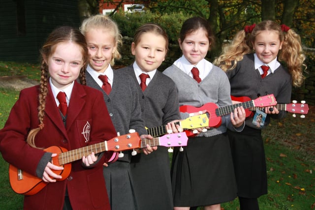 Children from Fyling Hall School perform in their ukelele orchestra.