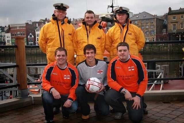Members of the Whitby RNLI football team gather for a pre-match photo.