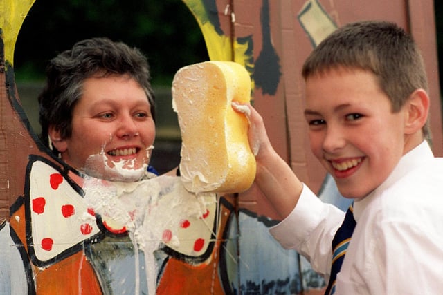 Pupils at Fulneck School had the opportunity too throw wet soapy sponges at the teachers to help raise money for Children in Need in November 1999. Pictured is  teacher Sally Edward with pupil Matthew Barrett.