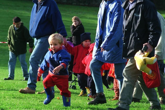 Hundreds of children gathered at Riverside Gardens in Ilkley to take part in the BBC Children in Need annual toddle in October 1998. Pictured is Joshua Craven
seen here striding out at the start.