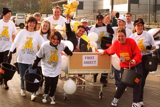 Chief executive Kevin Newman was the first passenger along with Pudsey Bear as the 25 strong First Direct team set off on charity bed push around the streets of Leeds.