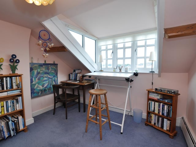 Office, reading or studio space within this room high in the building.