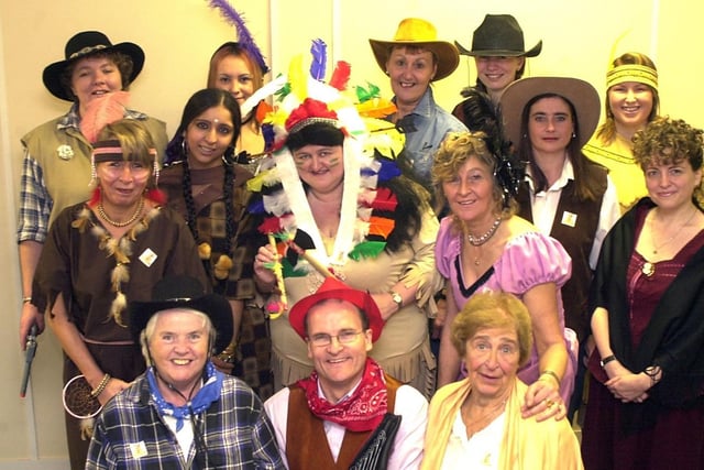 Staff at Towells dress up for wildwest day to raise money for Children in Need in 2004.