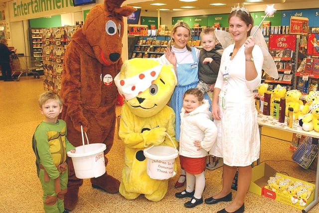 Children in Need event at Asda Wakefield. Trainee managers Ed Ashley, Daniel Newman, Jenny Ligger, Kirsty Gower collecting pennies from Tobby Smith, Isobel Sharp, Luke Irvin in 2005.