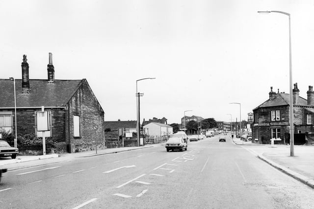 This view looks west along Britannia Road in June 1983. The junction with High Street is on the right, followed by the Stump Cross public house.