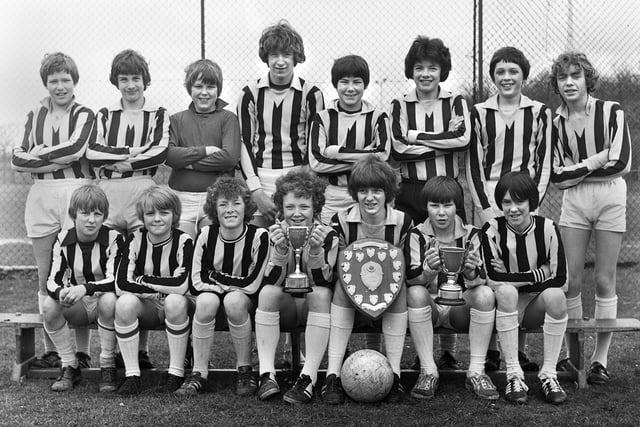 The Shevington High School Under 13s football team with trophies in April 1980.
They had won the Lancashire Evening Post Trophy as champions of the Wigan Metro Schools League, the schools 5-a-side final and shared the Lythgoe Knock-Out Cup with St. Thomas More RC High School.