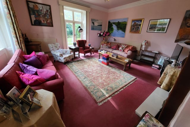 A cosy lounge within the Georgian property for sale in Sowerby.