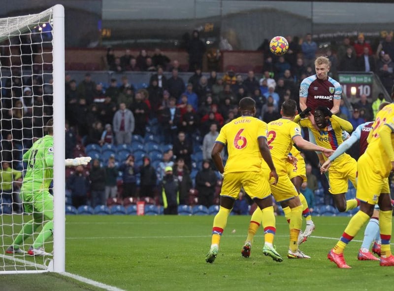 Ben Mee heads the Clarets level from Westwood's corner.