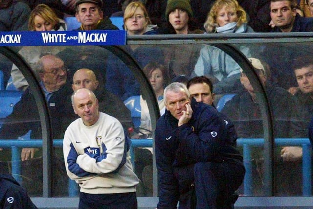 Caretaker manager Eddie Gray (right) looks on from the dug-out.