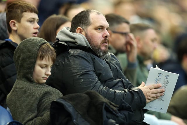 These PNE fans watch on as the game swings Cardiff's way in the second half