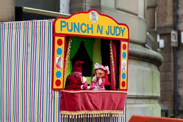 Festive fun day with a Punch and Judy show in Todmorden ahead of town's Christmas lights switch-on.