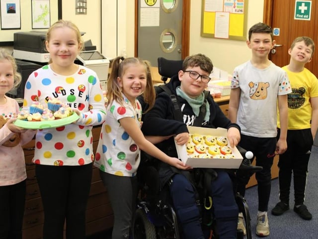 The school has thanked the Upton community for their help in raising a fantastic amount.