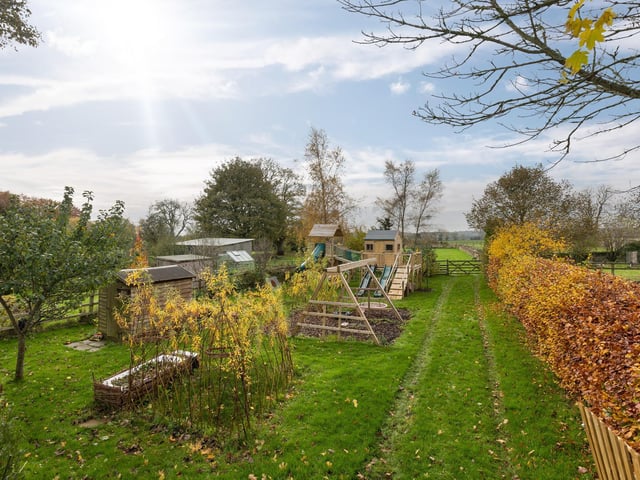 The extensive grounds include a children's adventure playground.