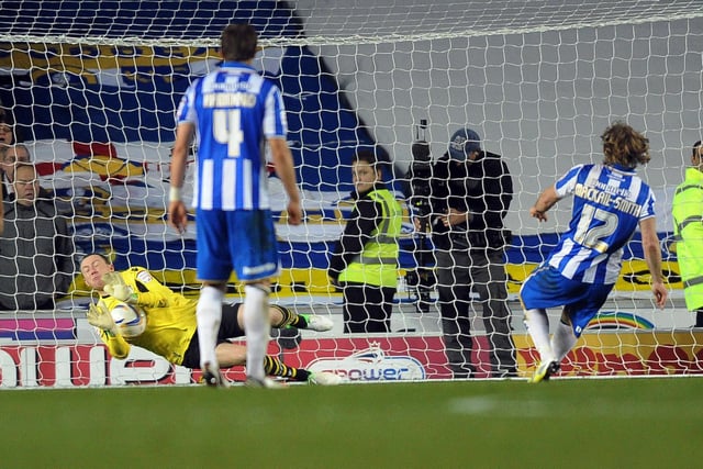 Paddy Kenny saves a penalty from Brighton's Craig Mackail-Smith.