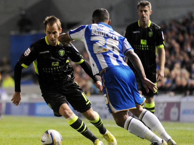 Luke Varney drives forward.