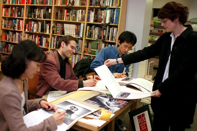 Northern Ballet artistic director Stefano Giannetti (centre) with dancers Chiaki Nagao and Hiro Takahashi sign copies of their new calendar at Borders bookshop in November 1999.